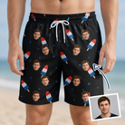 Man wearing Men's Popsicle Pride Custom Face Beach Shorts — custom faces printed all-over