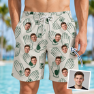 Man wearing Men's Glove Affair Custom Face Beach Shorts — custom faces printed all-over