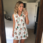 Real-life photo of someone wearing Women's Glove Affair Custom Face V-Neck Dress — custom faces printed all-over