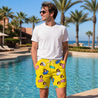 Real-life photo of someone wearing Men's Mighty Mitts Custom Face Beach Shorts — custom faces printed all-over