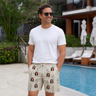 Real-life photo of someone wearing Men's Podium Putters Custom Face Beach Shorts — custom faces printed all-over