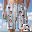 Man wearing Men's Foreward Motion Custom Face Beach Shorts — custom faces printed all-over