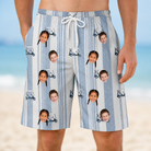 Model wearing Men's Foreward Motion Custom Face Beach Shorts printed with kids' faces