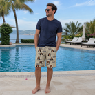 Real-life photo of someone wearing Men's Dinghy Dash Custom Face Beach Shorts — custom faces printed all-over
