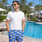 Real-life photo of someone wearing Men's Tuna Trawl Custom Face Beach Shorts — custom faces printed all-over