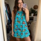 Real-life photo of someone wearing Women's Skiff Happens Custom Face Tank Dress — custom faces printed all-over