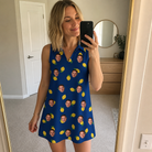 Real-life photo of someone wearing Women's Lemon Lilt Custom Face V-Neck Dress — custom faces printed all-over