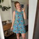 Real-life photo of someone wearing Women's Cane Cabaret Custom Face Tank Dress — custom faces printed all-over