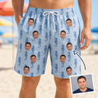 Man wearing Men's Bridle Bubbles Custom Face Beach Shorts — custom faces printed all-over