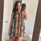 Real-life photo of someone wearing Women's Fishful Thinking Custom Face V-Neck Dress — custom faces printed all-over
