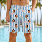 Model wearing Men's Dolphin Dazzle Custom Face Beach Shorts printed with kids' faces