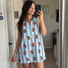 Real-life photo of someone wearing Women's Dolphin Dazzle Custom Face V-Neck Dress — custom faces printed all-over