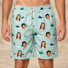 Model wearing Men's Manta Motion Custom Face Beach Shorts printed with kids' faces