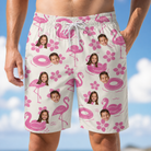 Model wearing Men's Buoyant Botanica Custom Face Beach Shorts printed with kids' faces