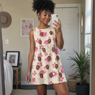 Real-life photo of someone wearing Women's Buoyant Botanica Custom Face Tank Dress — custom faces printed all-over