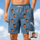 Man wearing Men's Magenta Mingle Custom Face Beach Shorts — custom faces printed all-over