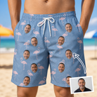 Man wearing Men's Flamingo Fever Custom Face Beach Shorts — custom faces printed all-over