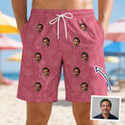 Man wearing Men's Beakside Belles Custom Face Beach Shorts — custom faces printed all-over