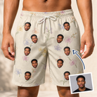 Man wearing Men's Vanda Vogue Custom Face Beach Shorts — custom faces printed all-over