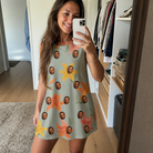 Real-life photo of someone wearing Women's Corolla Carnival Custom Face Tank Dress — custom faces printed all-over