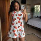 Real-life photo of someone wearing Women's Heartleaf Heat Custom Face Tank Dress — custom faces printed all-over