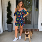 Full-length photo with the pet printed all over this Women's Pawsome Paisley Custom Dog Face Off-Shoulder Dress