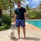 Full-length photo with the pet printed all over this Men's Quack Pack Custom Dog Face Beach Shorts