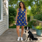 Full-length photo with the pet printed all over this Women's Quack Pack Custom Dog Face V-Neck Dress