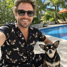Selfie with the pet whose face is printed all over this Men's Doggo Dandies Custom Dog Face Shirt & Shorts Set