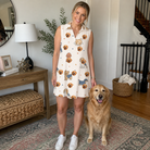 Full-length photo with the pet printed all over this Women's Woof Whimsy Custom Dog Face V-Neck Dress