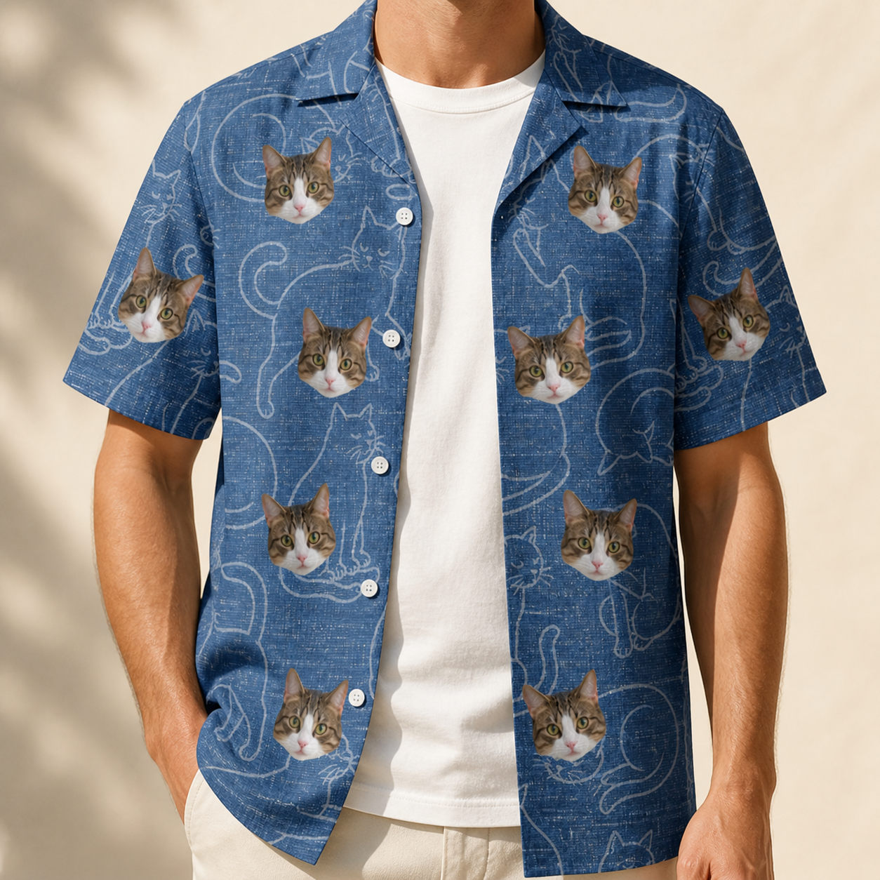 Man wearing Men's Mittens Mingle Custom Cat Face Hawaiian Shirt open over a white tee
