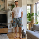 Full-length photo with the pet printed all over this Men's Kitten Kaboodle Custom Cat Face Beach Shorts