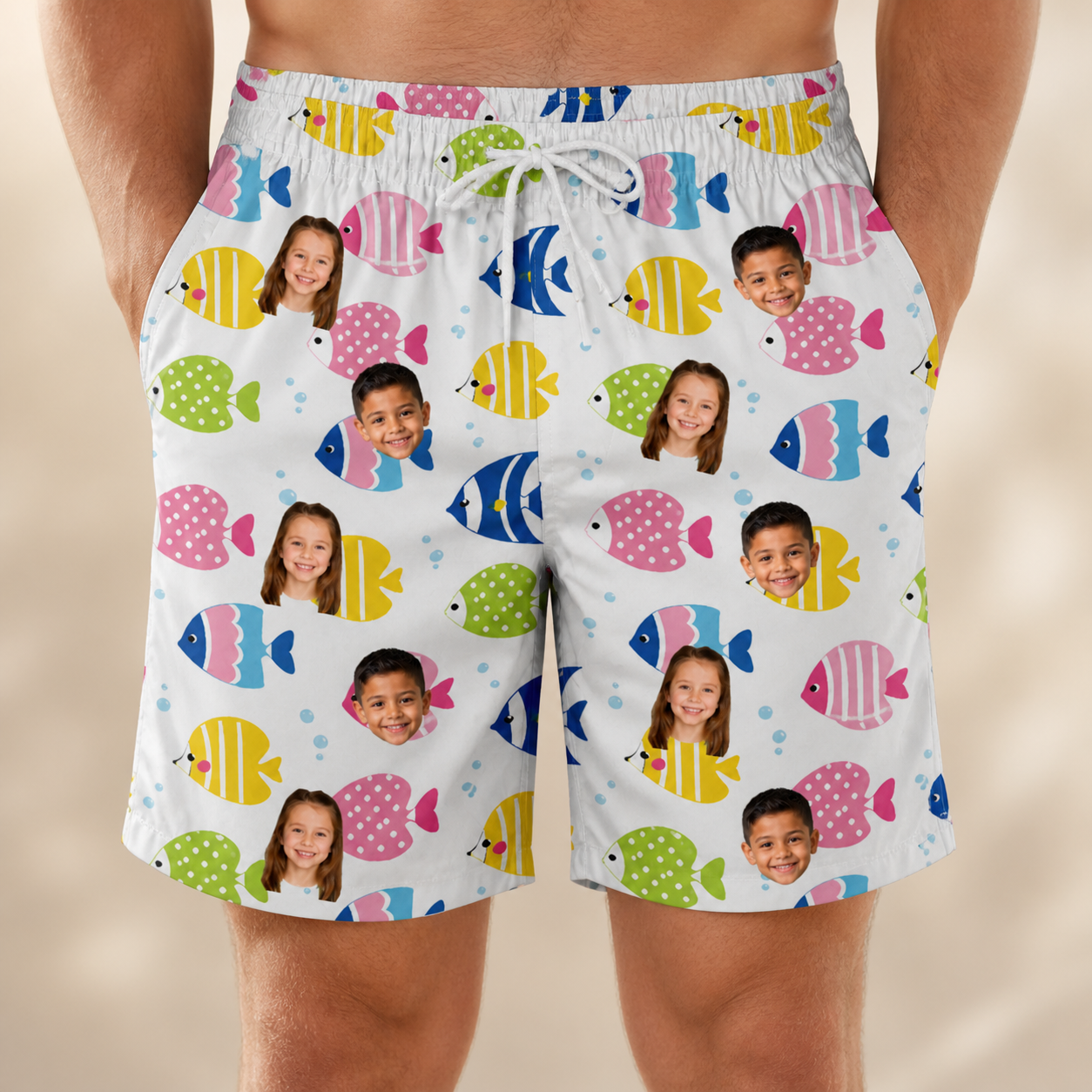 Model wearing Men's Guppy Gyrations Custom Face Beach Shorts printed with kids' faces
