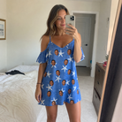 Real-life photo of someone wearing Women's Starfish Swerve Custom Face Off-Shoulder Dress — custom faces printed all-over