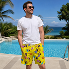 Real-life photo of someone wearing Men's Nacre Nonsense Custom Face Beach Shorts — custom faces printed all-over