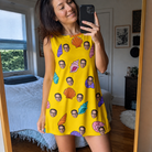 Real-life photo of someone wearing Women's Nacre Nonsense Custom Face Tank Dress — custom faces printed all-over