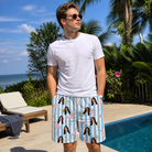 Real-life photo of someone wearing Men's Cerise Sashay Custom Face Beach Shorts — custom faces printed all-over