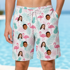 Model wearing Men's Long-Legged Luau Custom Face Beach Shorts printed with kids' faces