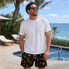 Real-life photo of someone wearing Men's Flocktail Hour Custom Face Beach Shorts — custom faces printed all-over