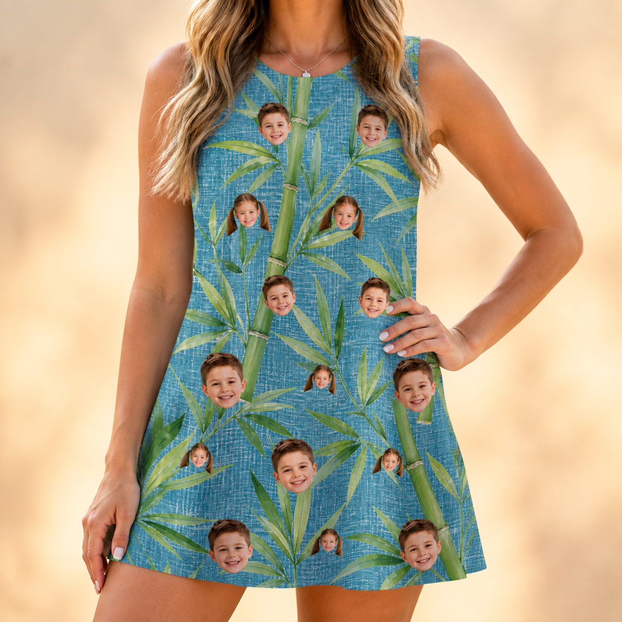 Model wearing Women's Bamboo Boogie Custom Face Tank Dress printed with kids' faces
