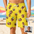 Man wearing Men's Nutty Nectar Custom Face Beach Shorts — custom faces printed all-over