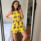Real-life photo of someone wearing Women's Nutty Nectar Custom Face Tank Dress — custom faces printed all-over