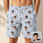 Man wearing Men's Rum Reverie Custom Face Beach Shorts — custom faces printed all-over