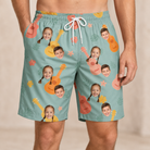 Model wearing Men's Hula Harmonics Custom Face Beach Shorts printed with kids' faces