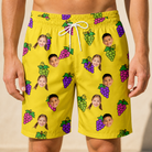 Model wearing Men's Vineyard Vibes Custom Face Beach Shorts printed with kids' faces