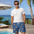 Real-life photo of someone wearing Men's Finny Business Custom Face Beach Shorts — custom faces printed all-over