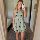 Real-life photo of someone wearing Women's Pole Position Custom Face V-Neck Dress — custom faces printed all-over