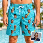 Man wearing Men's Barbed Banter Custom Face Beach Shorts — custom faces printed all-over