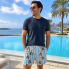 Real-life photo of someone wearing Men's Tuna Tactics Custom Face Beach Shorts — custom faces printed all-over