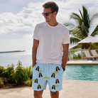 Real-life photo of someone wearing Men's Turf Tactics Custom Face Beach Shorts — custom faces printed all-over